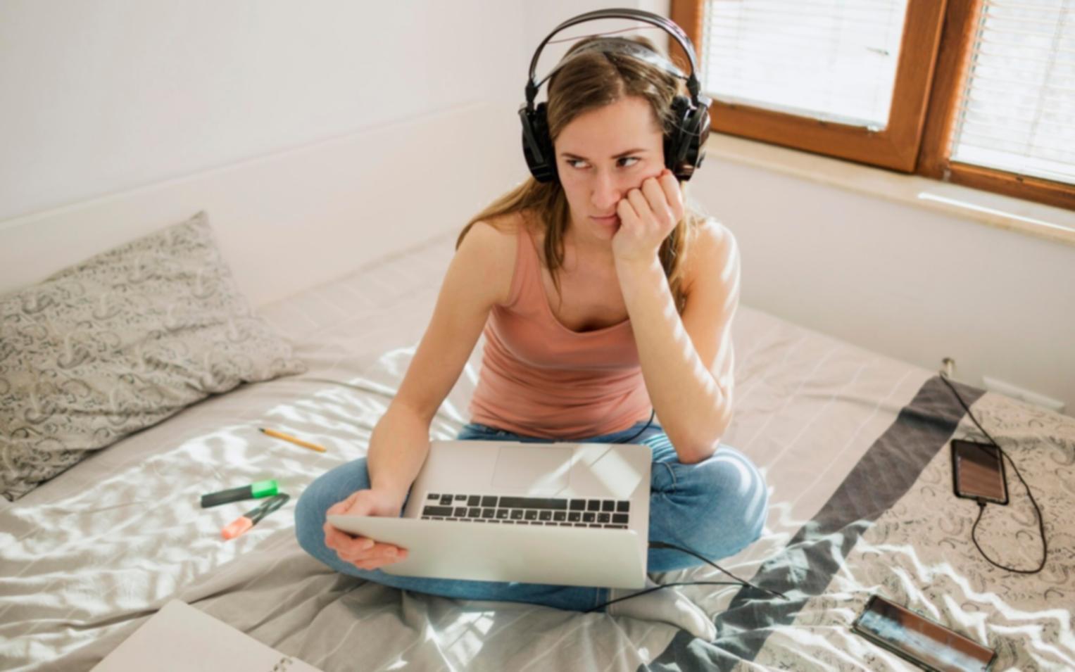 Financial professional analysing budget risk data on computer screens